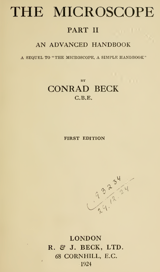 A book with a signature
Description automatically generated