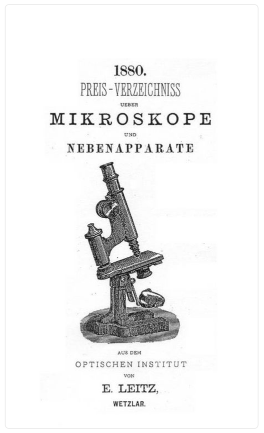 A book cover with a microscope
Description automatically generated