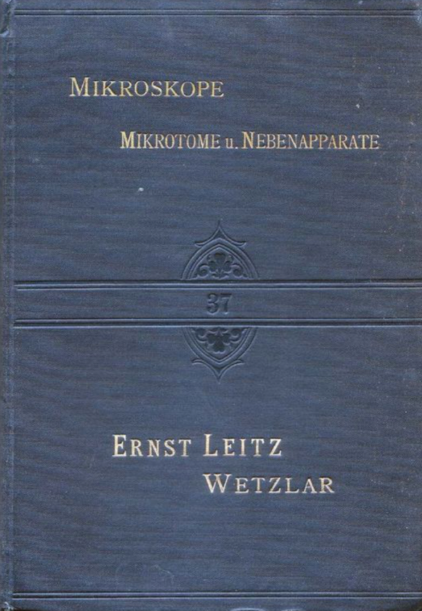 A blue book with gold text
Description automatically generated