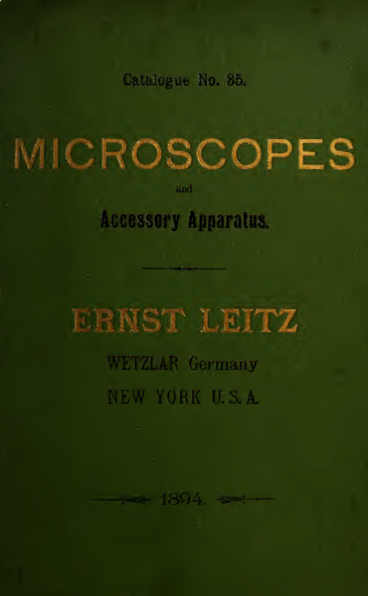 A green book with gold text
Description automatically generated