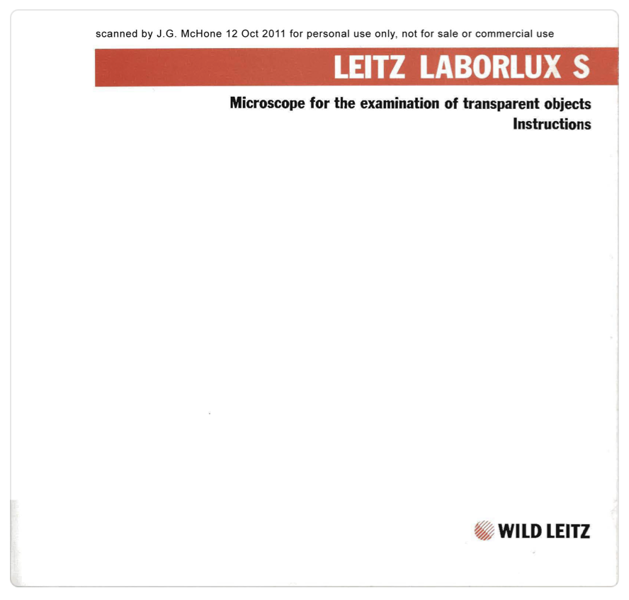 A white rectangular object with red and black text
Description automatically generated