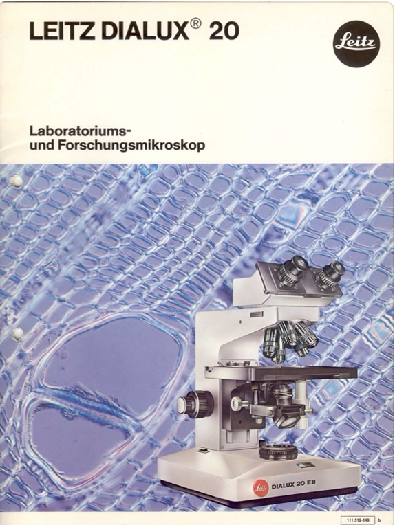 A close-up of a microscope
Description automatically generated