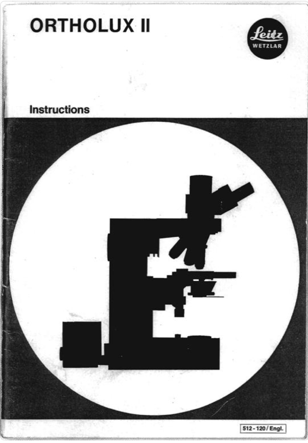 A black and white cover with a microscope
Description automatically generated