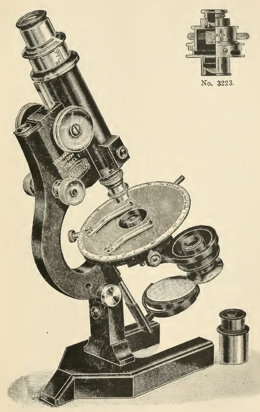 A picture containing indoor, microscope
Description automatically generated