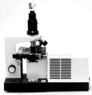 A close-up of a microscope
Description automatically generated
