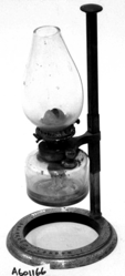 A picture containing lamp, still life photography, still life, indoor
Description automatically generated