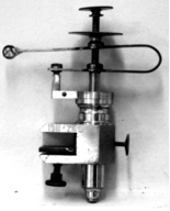 A picture containing cylinder, machine
Description automatically generated