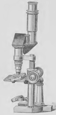 A picture containing indoor, table, old, metal
Description automatically generated