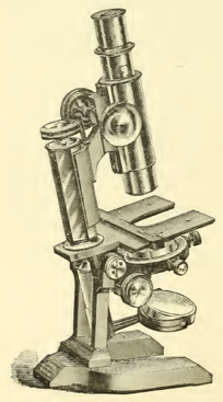 A picture containing indoor, old, photo, table
Description automatically generated