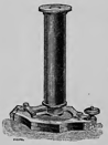 A picture containing sitting, table, small, old
Description automatically generated