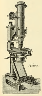 A picture containing sitting, old, engine
Description automatically generated