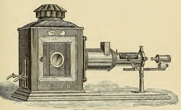A picture containing photo, old, clock, sitting
Description automatically generated