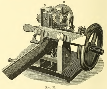 A vintage photo of a gun
Description automatically generated