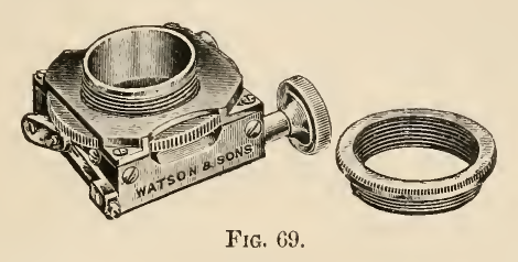 A picture containing sitting, cup, old, table
Description automatically generated