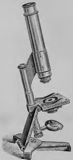 A picture containing metal, sitting, pole, old
Description automatically generated
