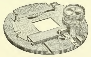 A picture containing object, clock
Description automatically generated