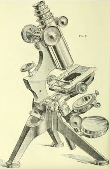 A picture containing old, sitting, motorcycle, table
Description automatically generated