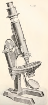 A picture containing microscope, object, indoor, old
Description automatically generated