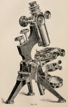 A picture containing object, motorcycle, person, old
Description automatically generated
