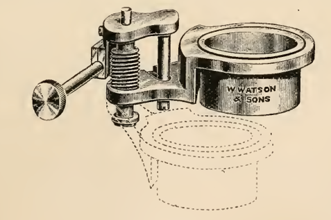 A picture containing indoor, cup, table, sitting
Description automatically generated