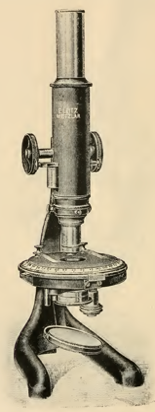 A picture containing indoor, old, sitting, table
Description automatically generated
