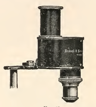 A picture containing sitting, old, small, table
Description automatically generated