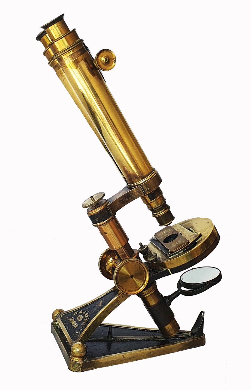 A close-up of a microscopeDescription automatically generated